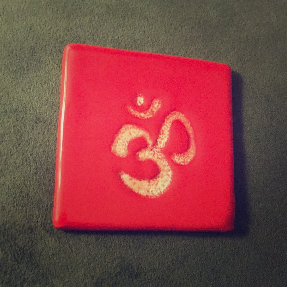 Hand crafted/Painted porcelain red OM coaster. New